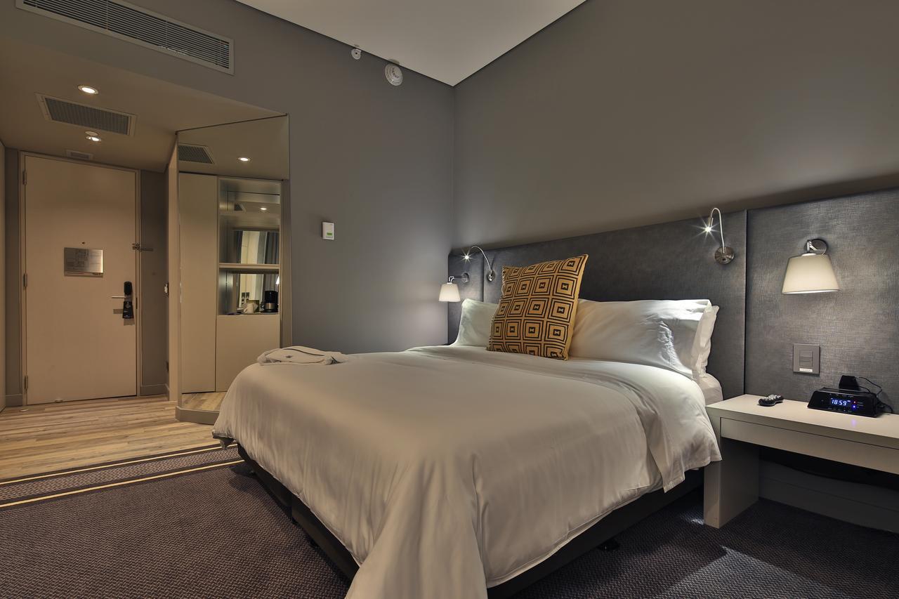 ホテル モヴィッチ ビューロ 51 バランキージャ エクステリア 写真 A bedroom at the hotel
